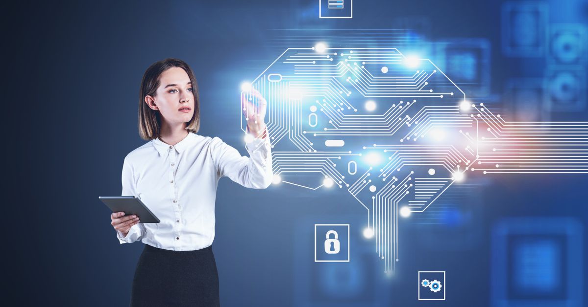 phone, fintech notebook, and coffee cup on table, with a hand over the notebook with a pen.